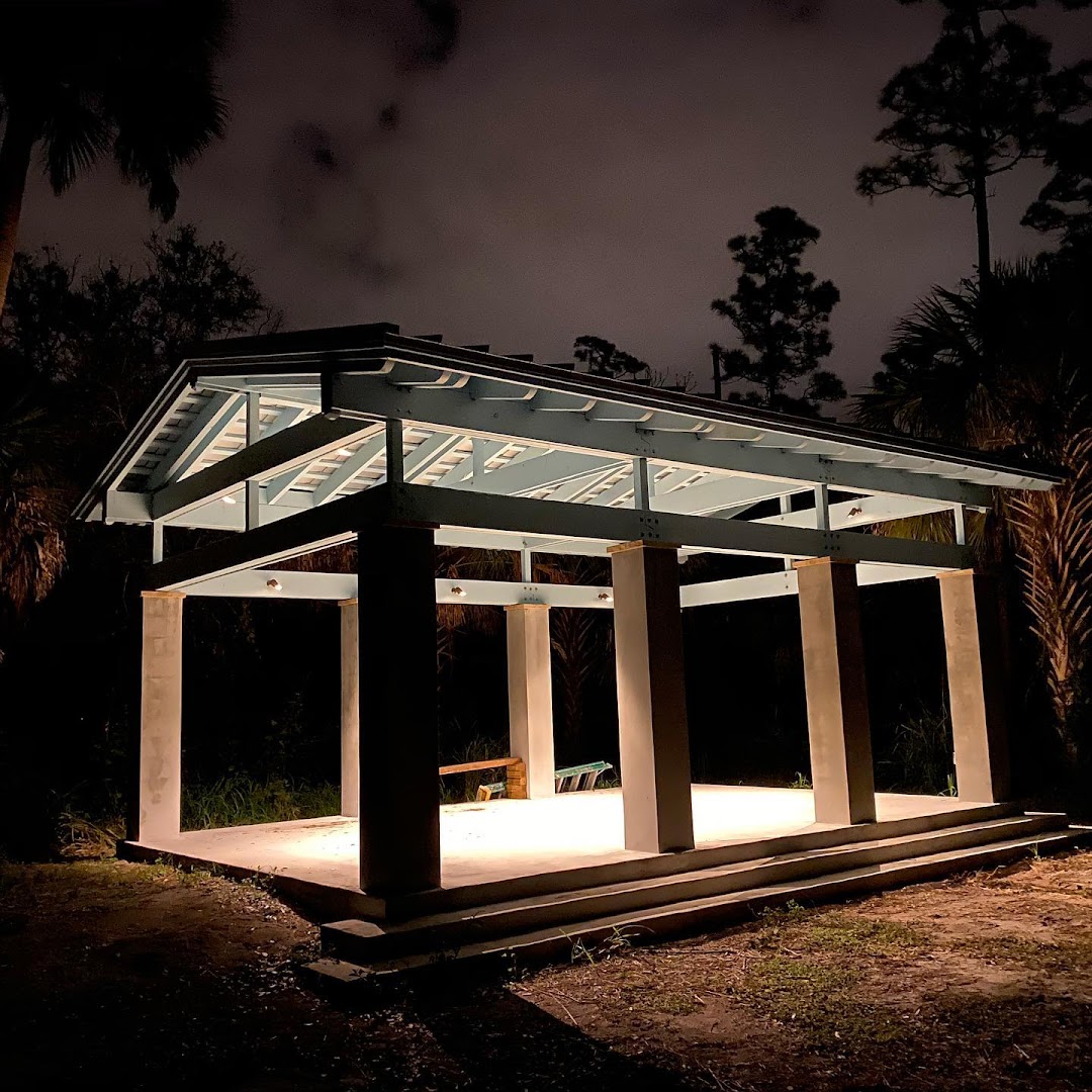 Lit glass structure at night wired by Brandon Blais Electric, Vero Beach FL